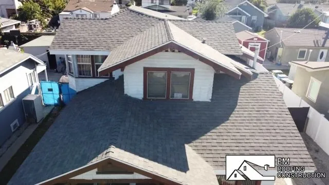 Slide of EM Roofing Construction