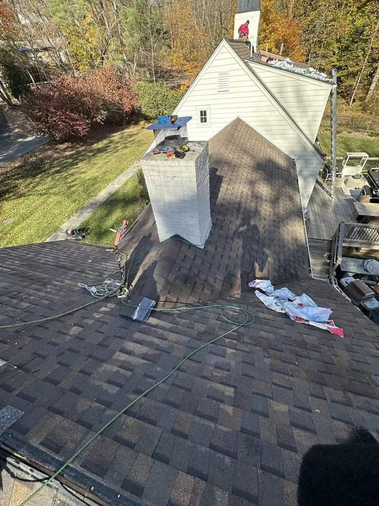 Slide of EM Roofing