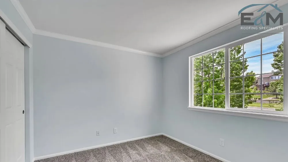 Slide of E&M Roofing Specialists