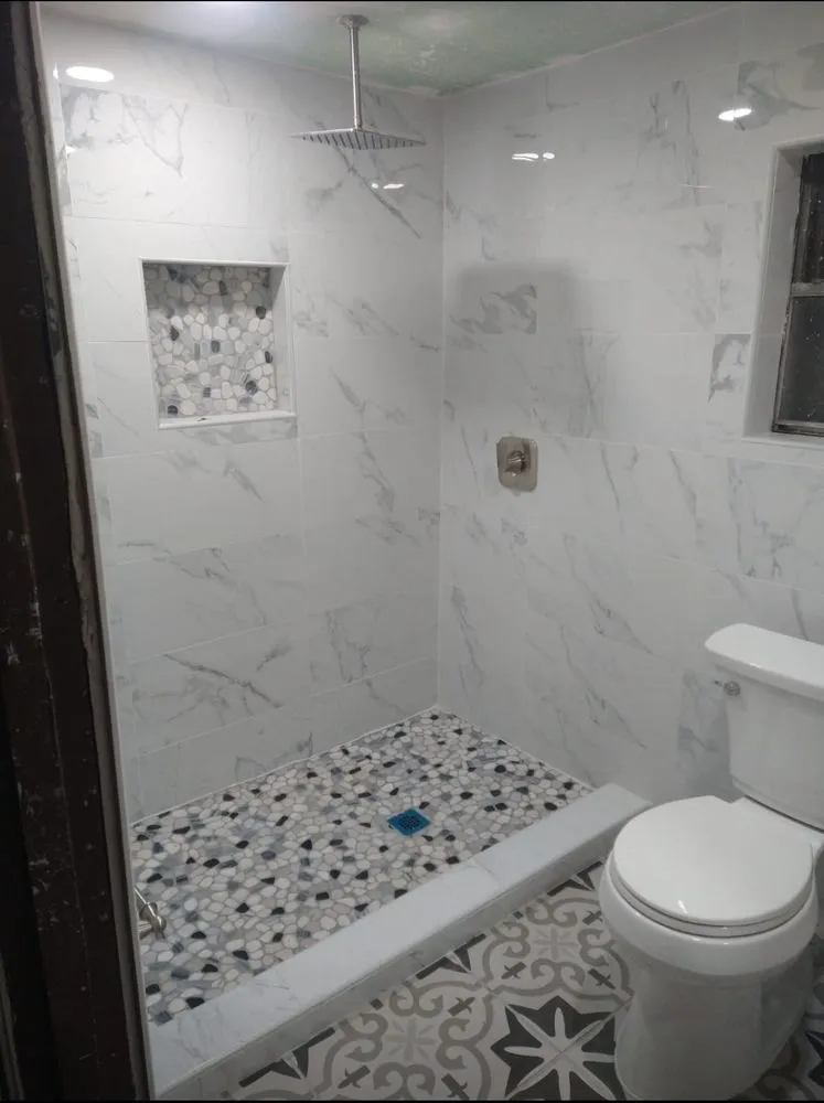 Slide of Emanuel Construction