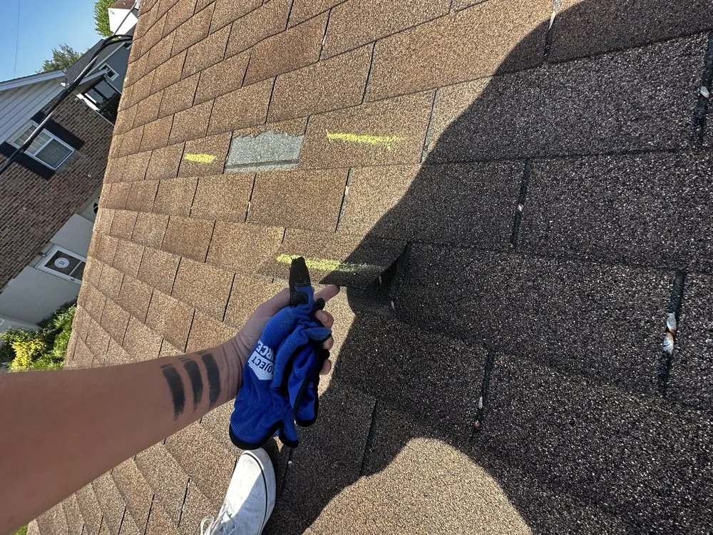 Slide of Ember Roofing