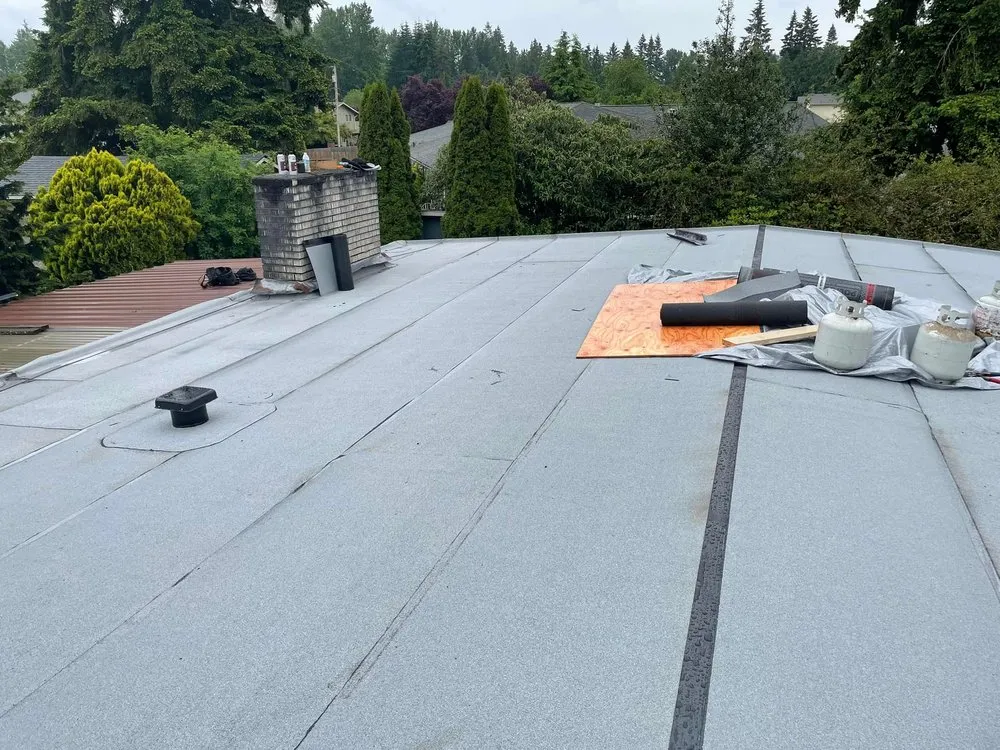 Slide of Emerald Mountain Roofing