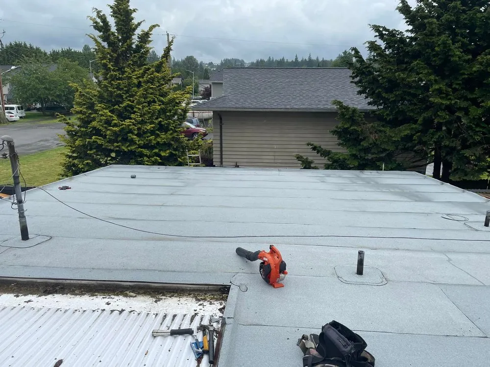 Slide of Emerald Mountain Roofing