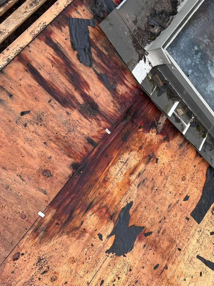 Slide of Emerald Mountain Roofing