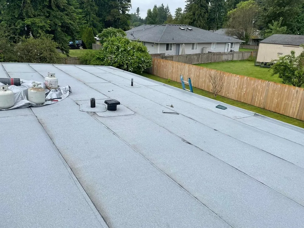 Slide of Emerald Mountain Roofing