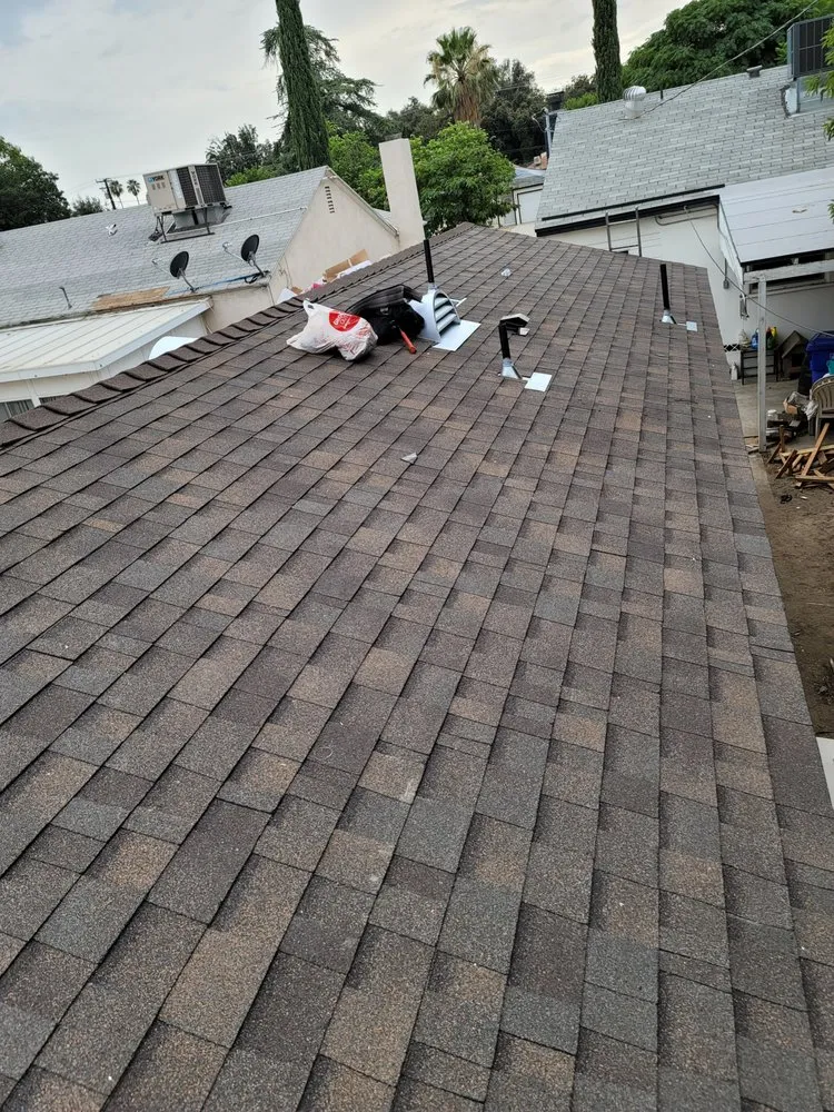 Slide of Eminent Roofing