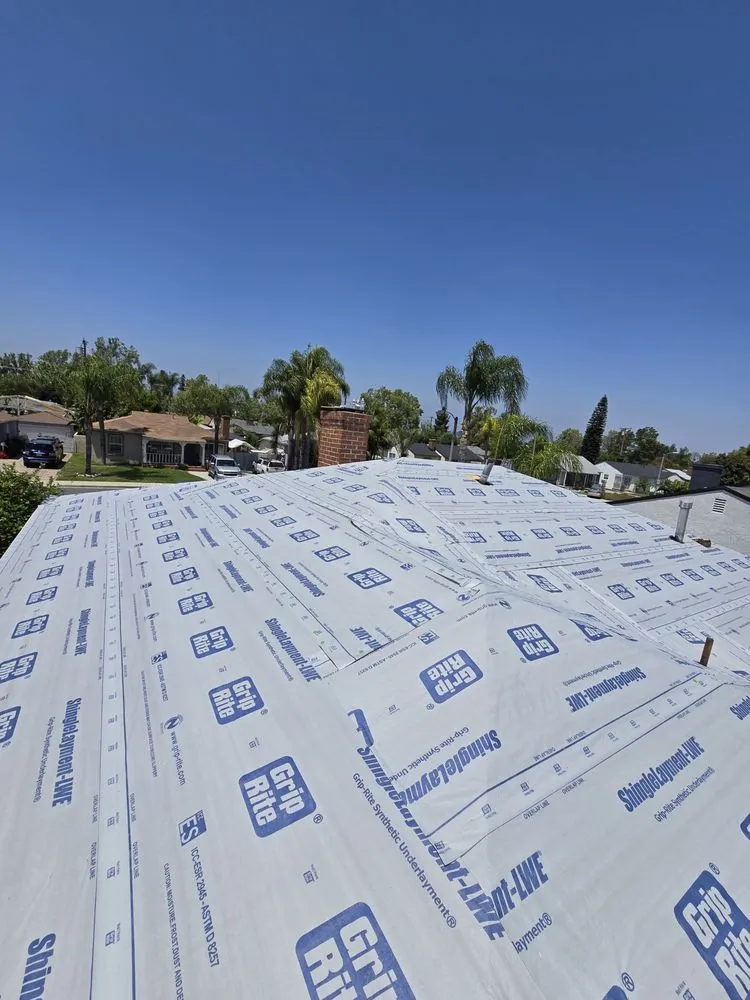 Slide of Eminent Roofing