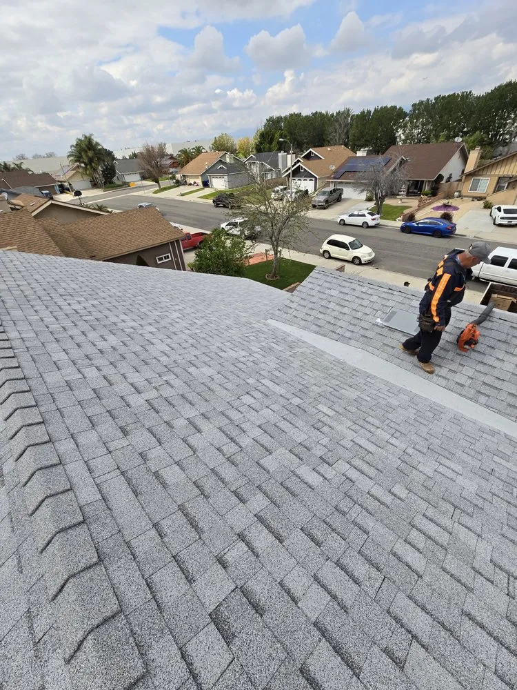 Slide of Eminent Roofing