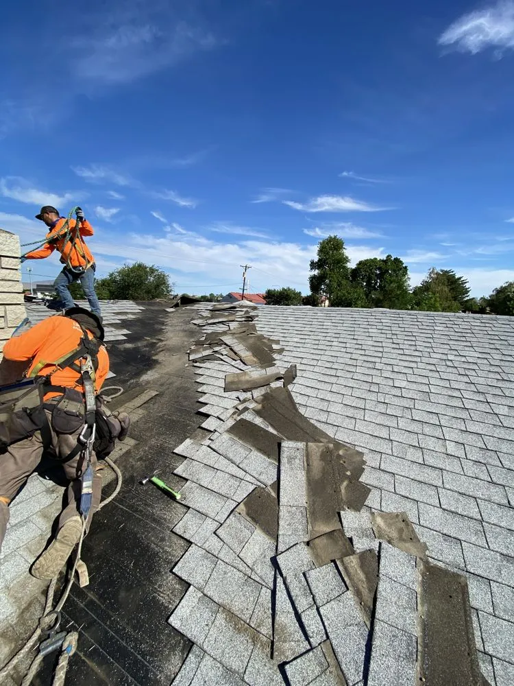 Slide of Eminent Roofing