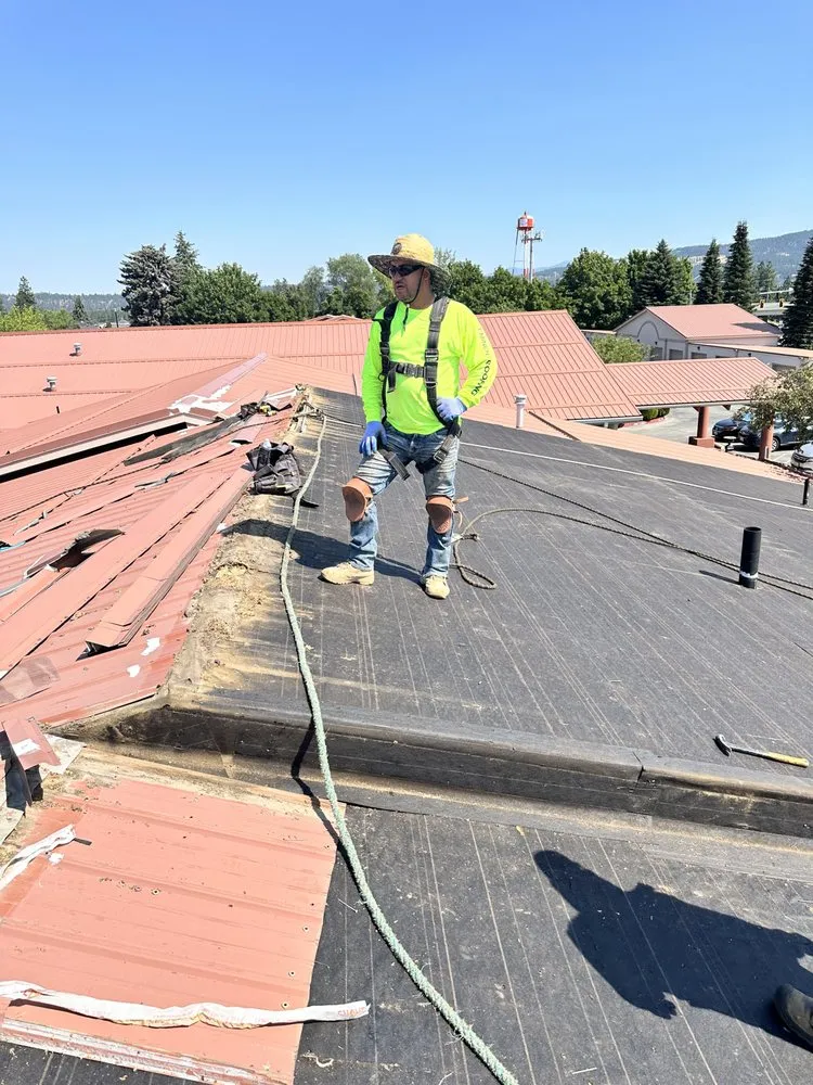 Slide of Eminent Roofing