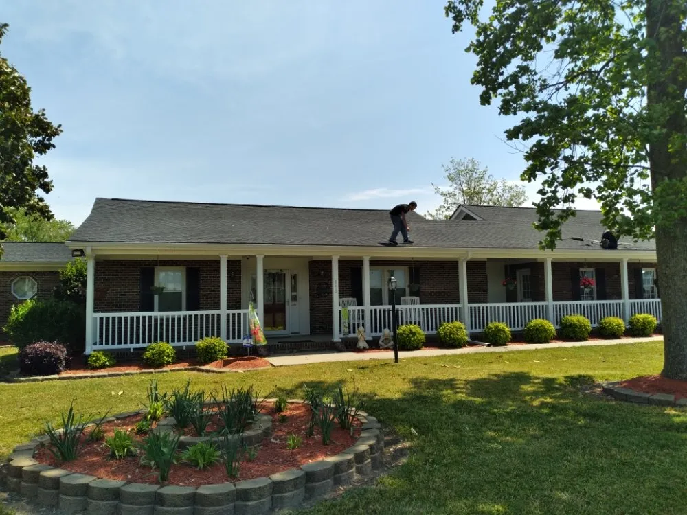 Slide of Emperor Roofing