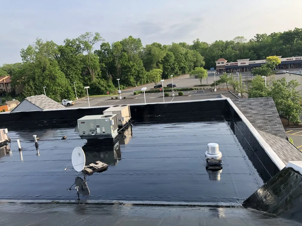 Slide of Empire Commercial Roofing specialist