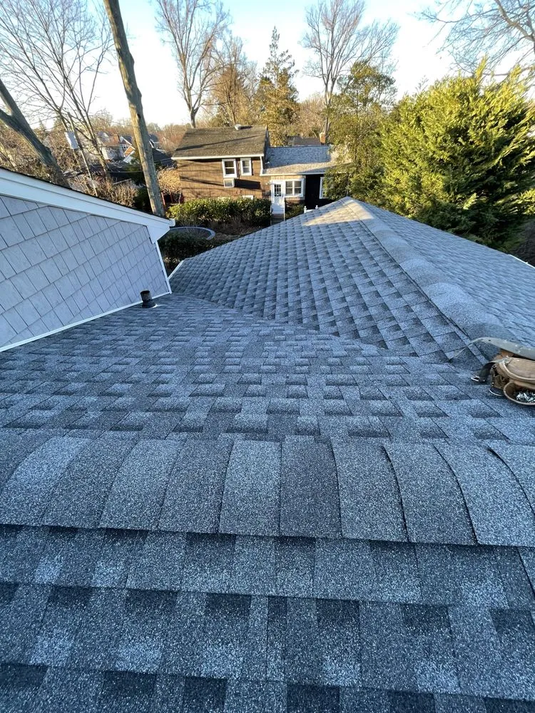 Slide of Empire Gen Roofing and Chimney