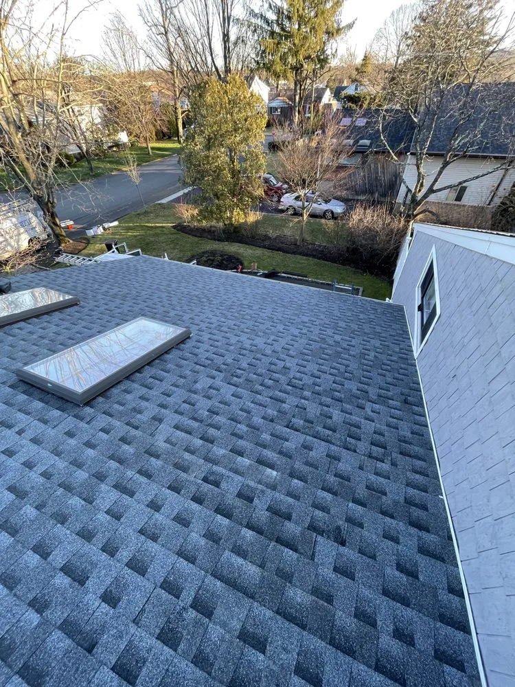 Slide of Empire Gen Roofing and Chimney