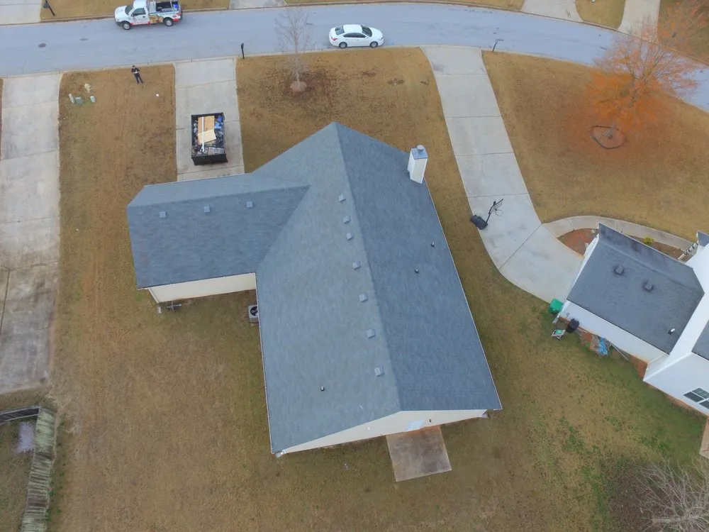 Slide of Empire Roofing & Restoration