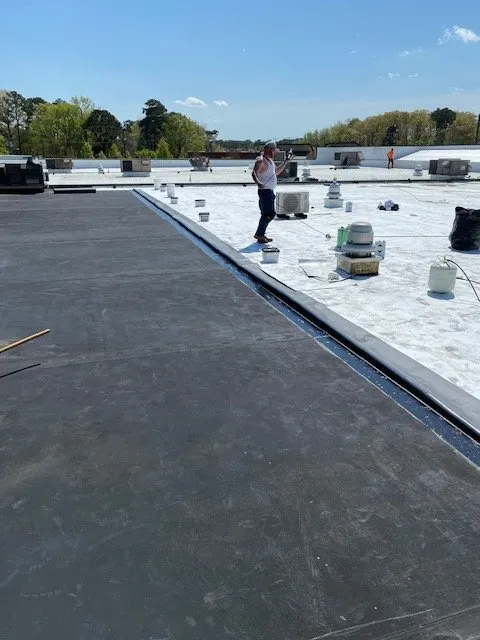 Slide of Empire Roofing & Siding