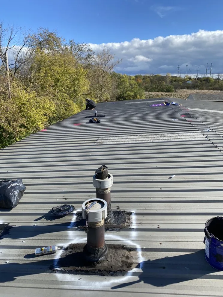 Slide of Empire Roofing & Tuck Pointing