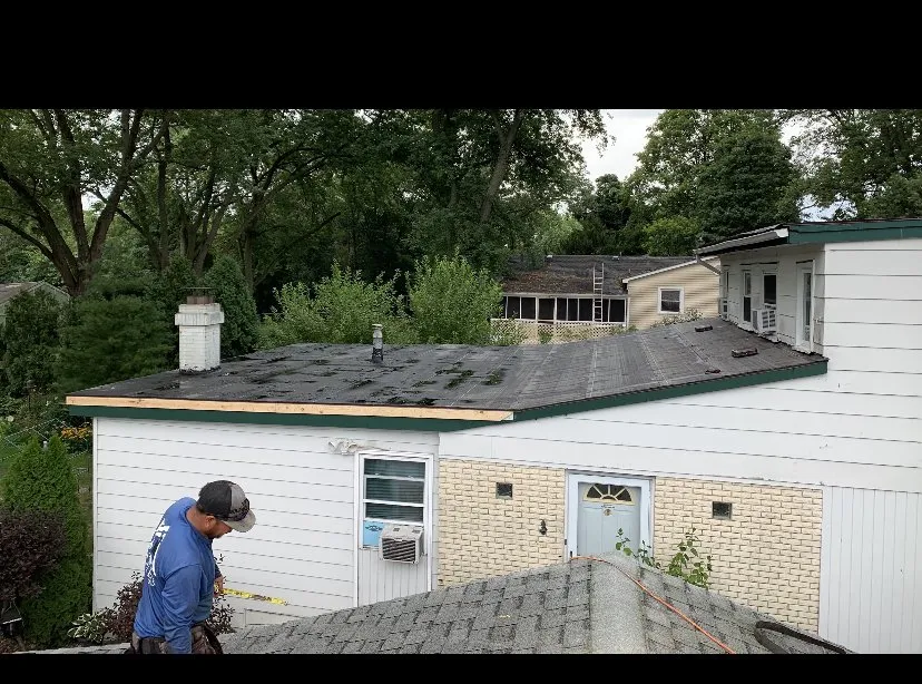 Slide of Empire Roofing & Tuck Pointing