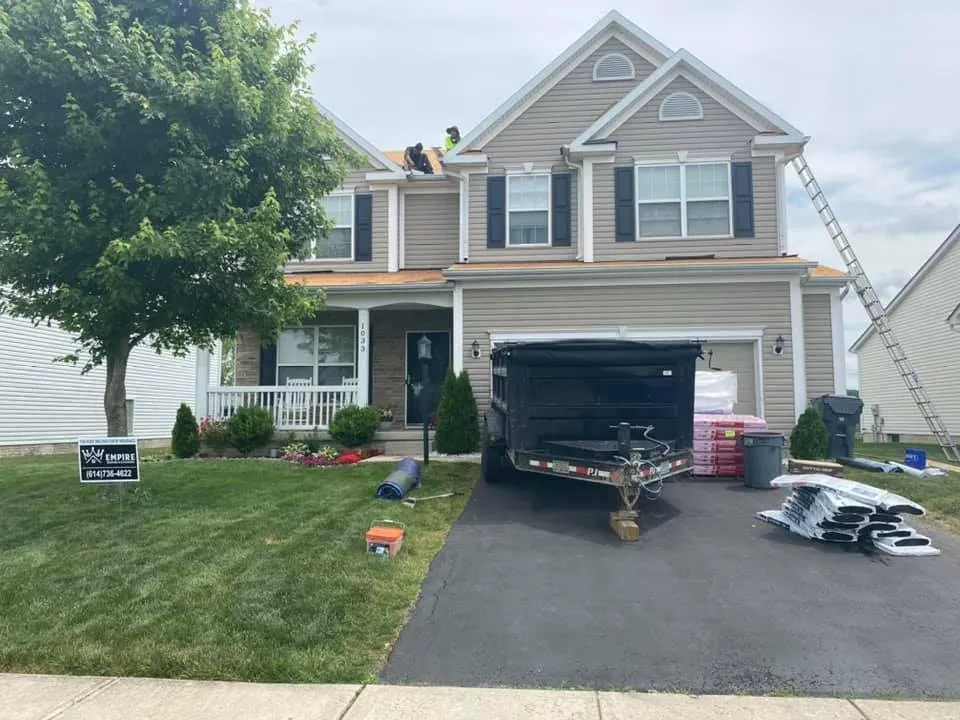 Slide of Empire Roofing and Exteriors