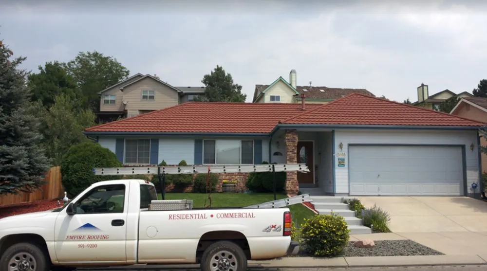 Slide of Empire Roofing and Restoration