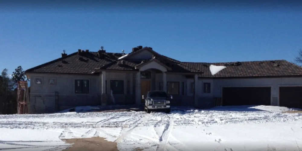 Slide of Empire Roofing and Restoration