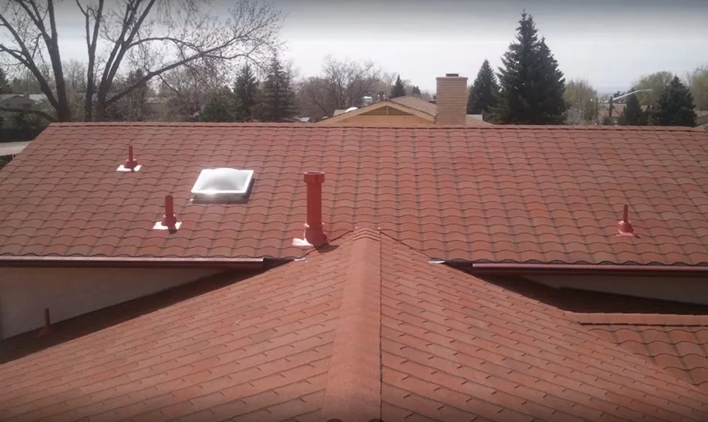 Slide of Empire Roofing and Restoration