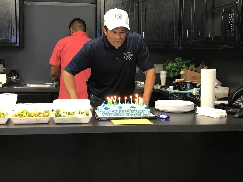 Slide of Empire Roofing