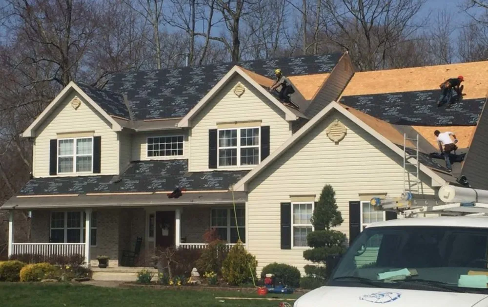 Slide of Empire Roofing