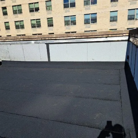 Slide of Empire State Roofing