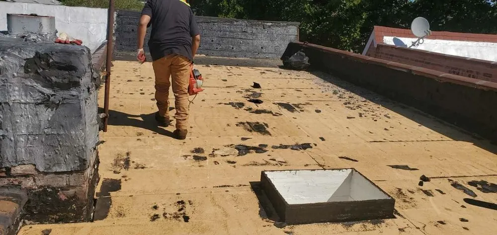 Slide of Empire State Roofing