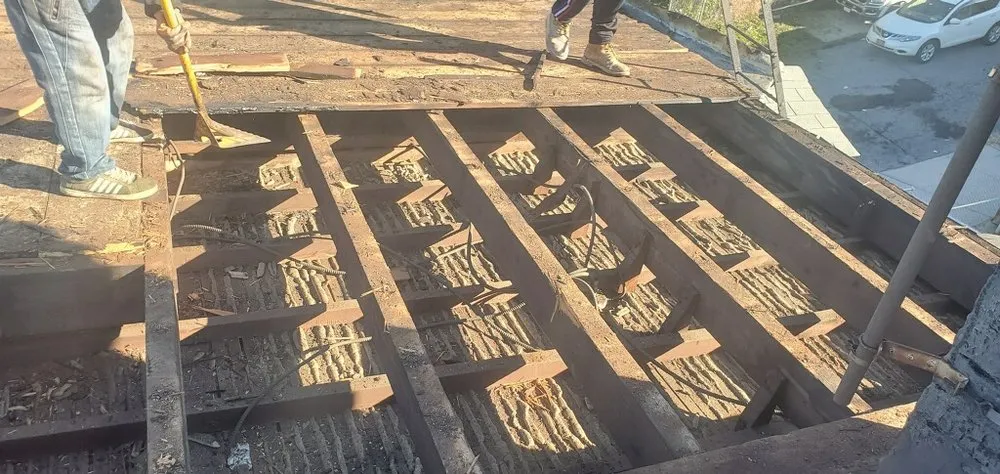 Slide of Empire State Roofing