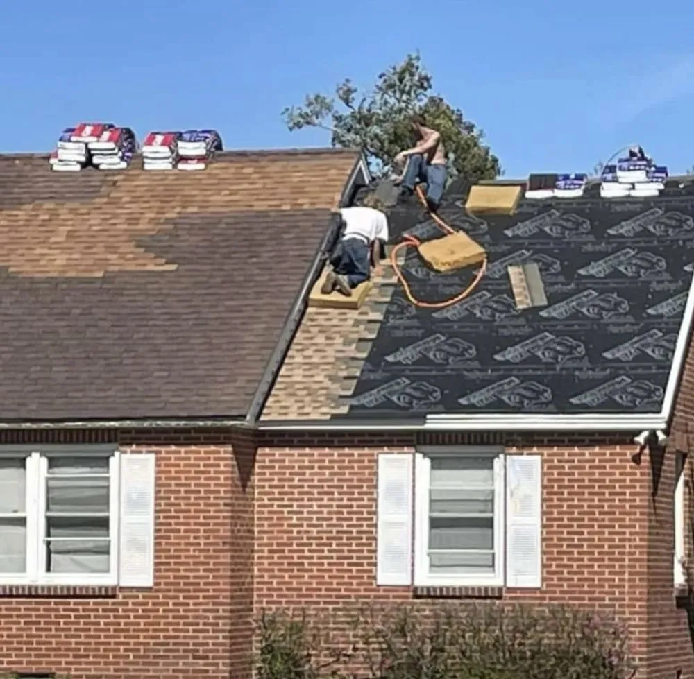 Slide of Empire State Roofing
