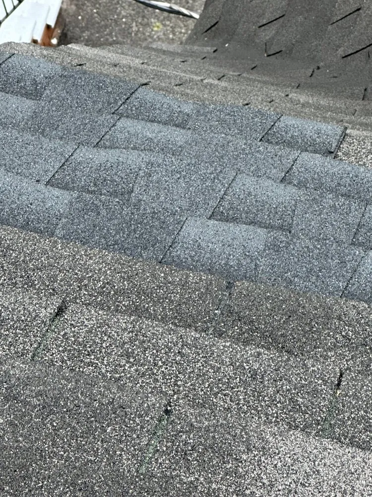 Slide of Empire State Roofing