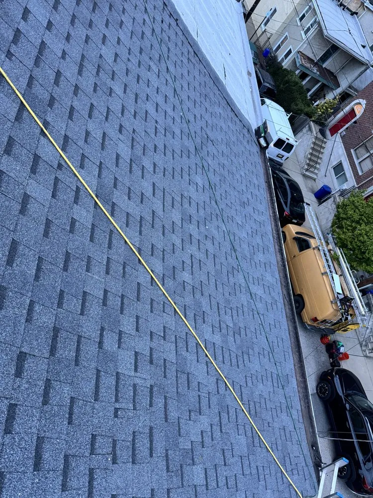 Slide of EMS Roofing, llc