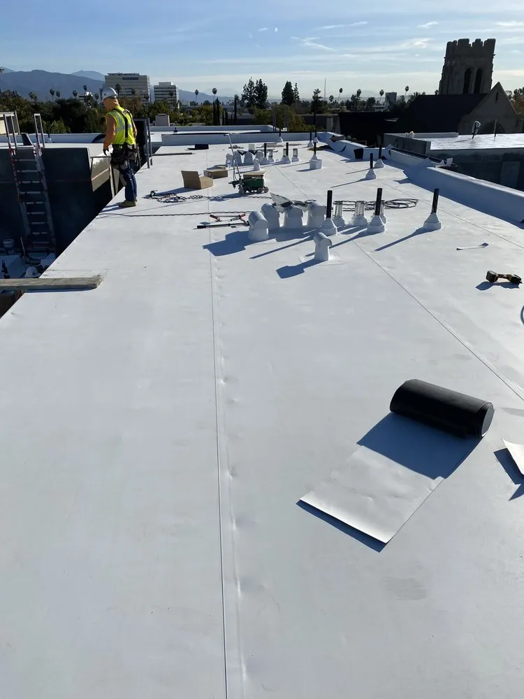 Slide of Ena Roofing