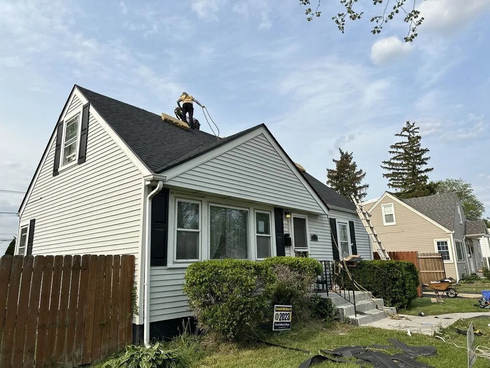 Slide of Enrique's Roofing