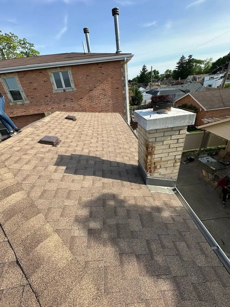 Slide of Enrique's Roofing