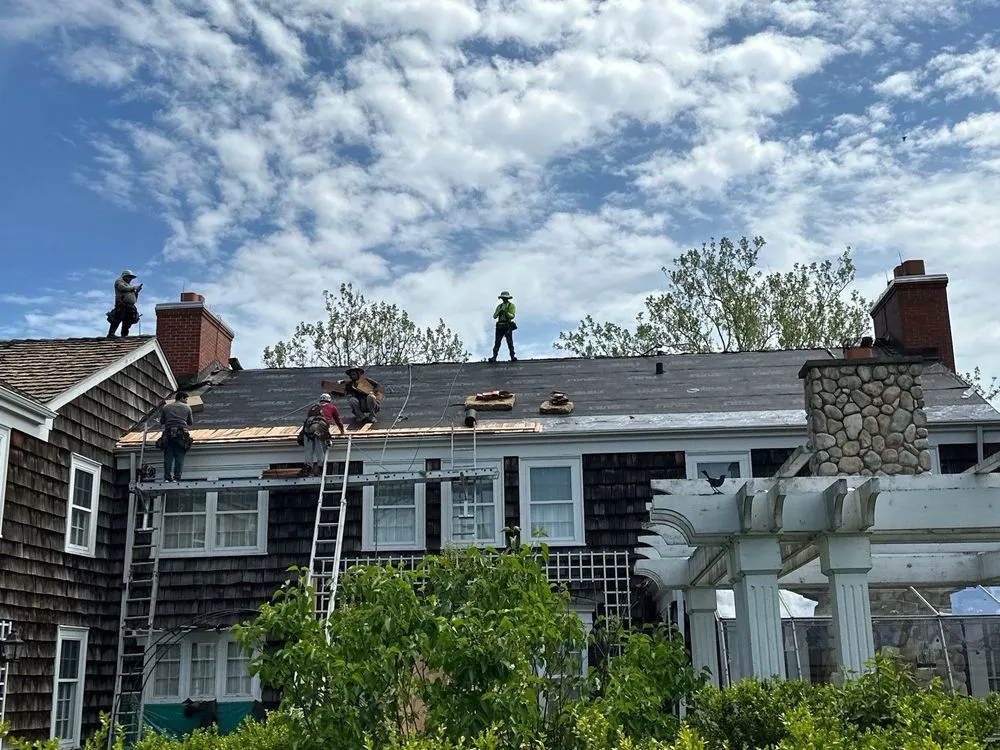 Slide of Enrique's Roofing