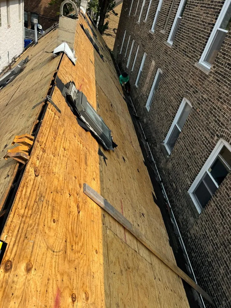 Slide of Enrique's Roofing