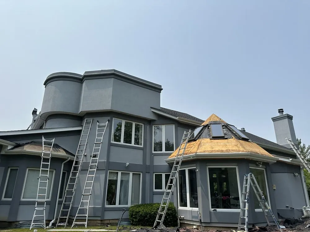 Slide of Enrique's Roofing