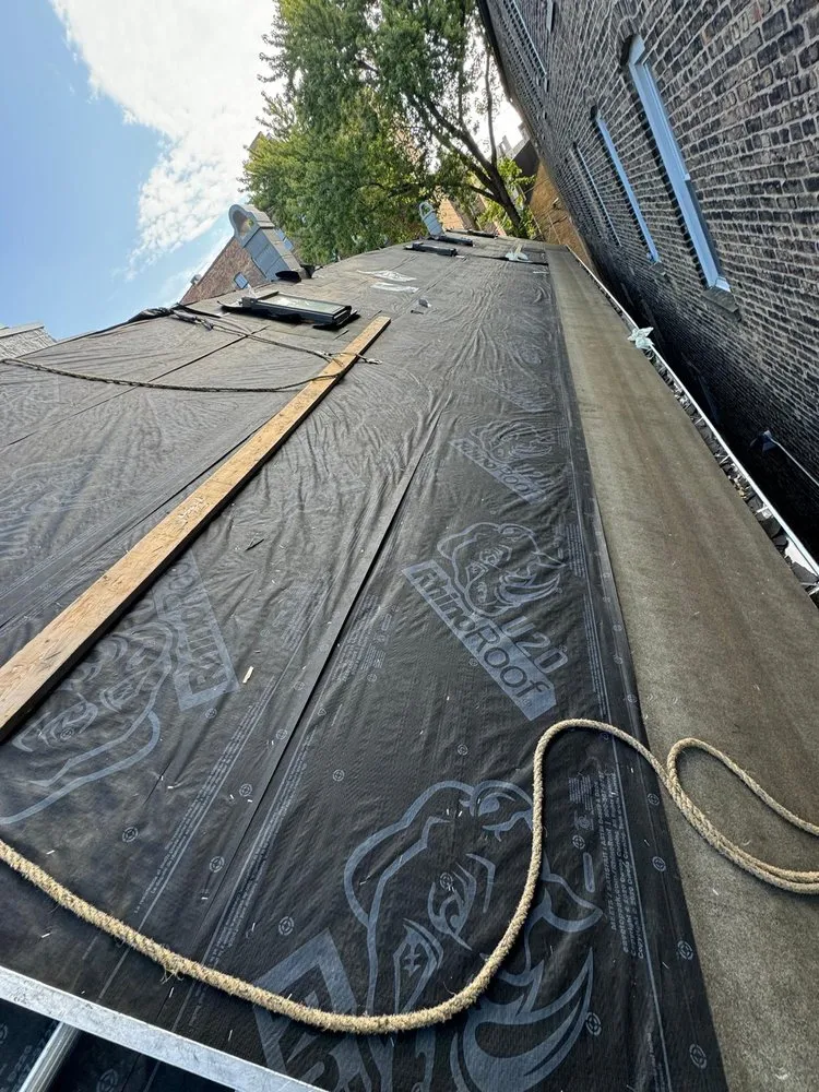 Slide of Enrique's Roofing