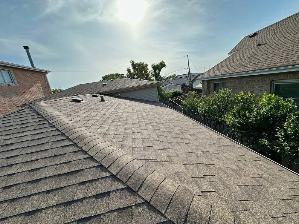 Slide of Enrique's Roofing