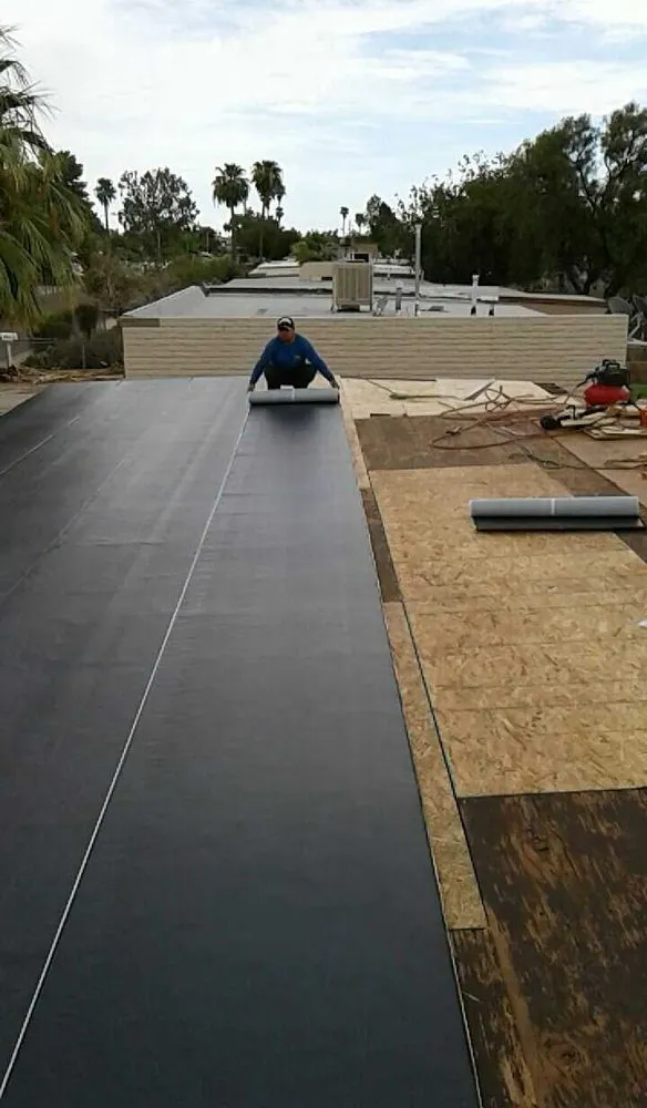 Slide of Enriquez Roofing