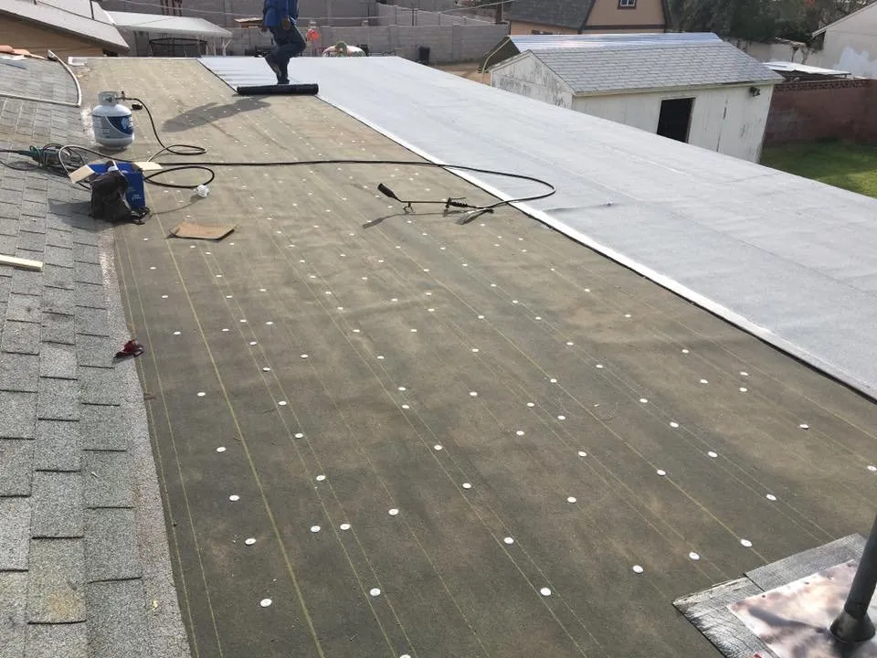 Slide of Enriquez Roofing