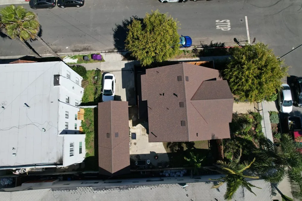 Slide of Enriquez Roofing