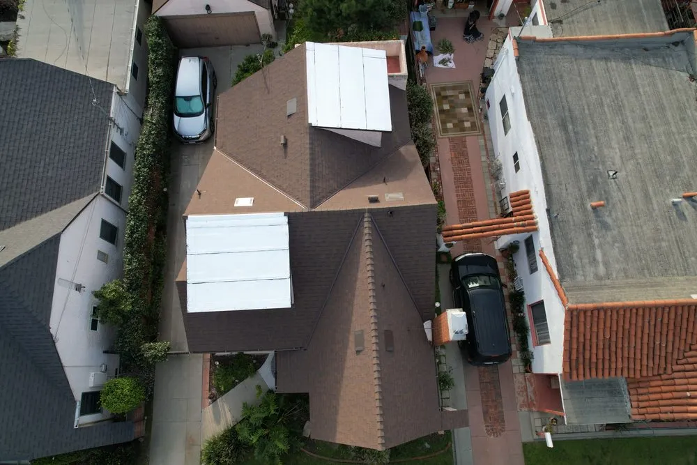 Slide of Enriquez Roofing