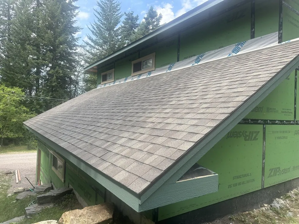 Slide of Enzee Roofing