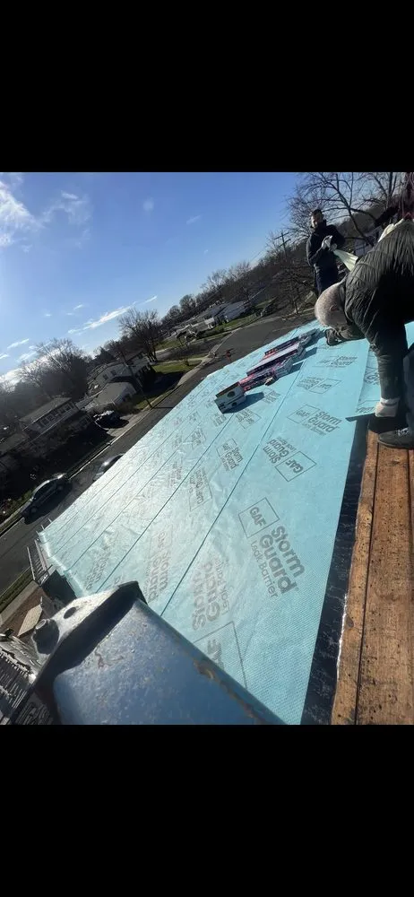 Slide of Enzo roofing