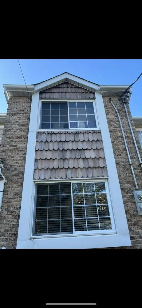 Slide of Enzo roofing