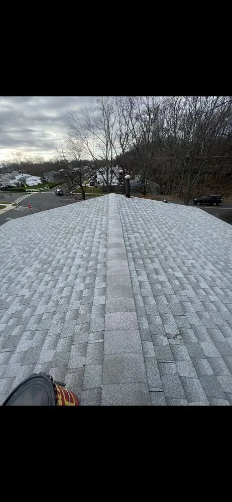 Slide of Enzo roofing